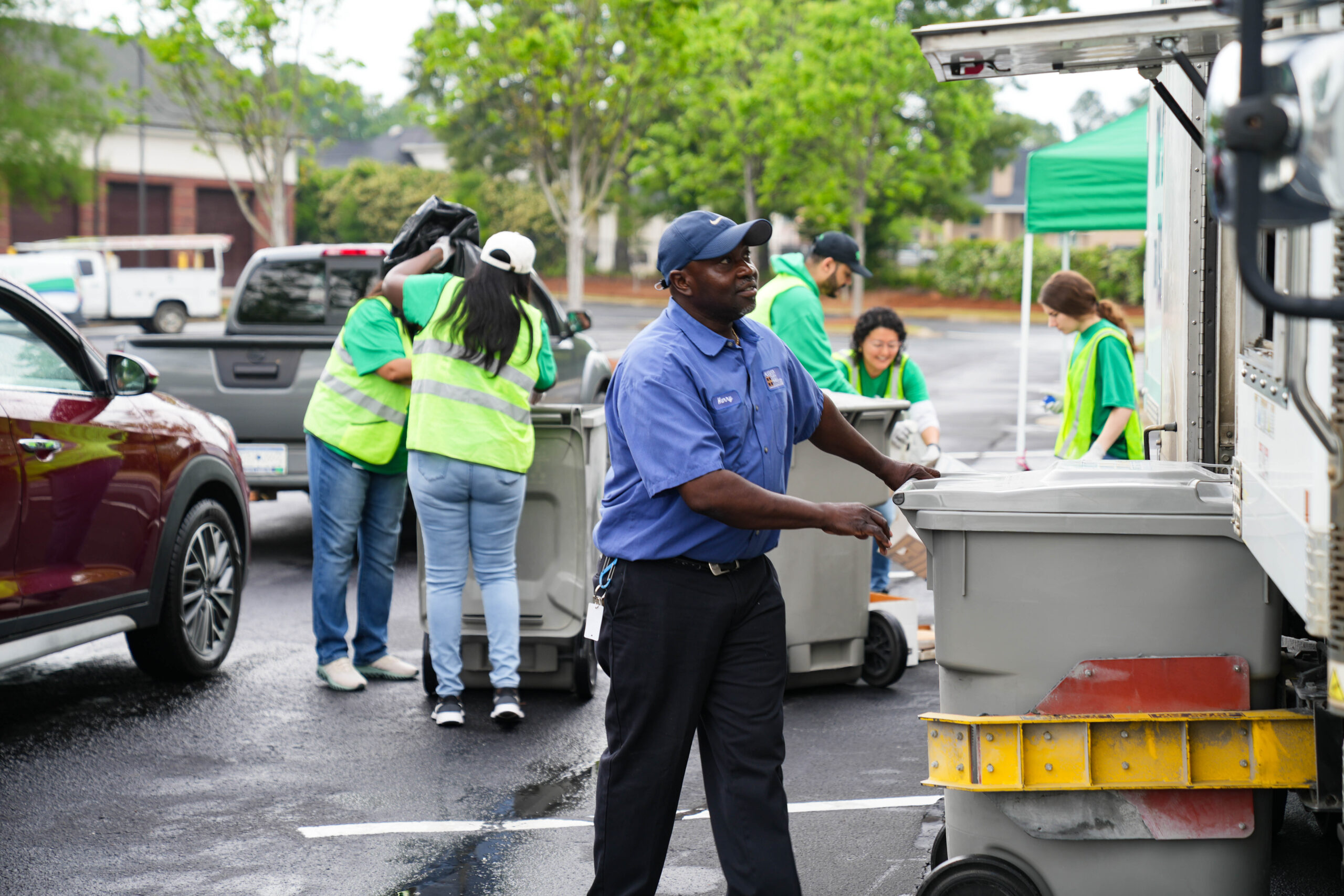 Employees from SRP Federal Credit Union and Augusta Data Storage receive and prepare old documents for the shred truck at the Spring 2025 SRP Shred Fest.