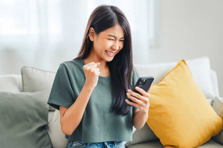 Excited young woman
