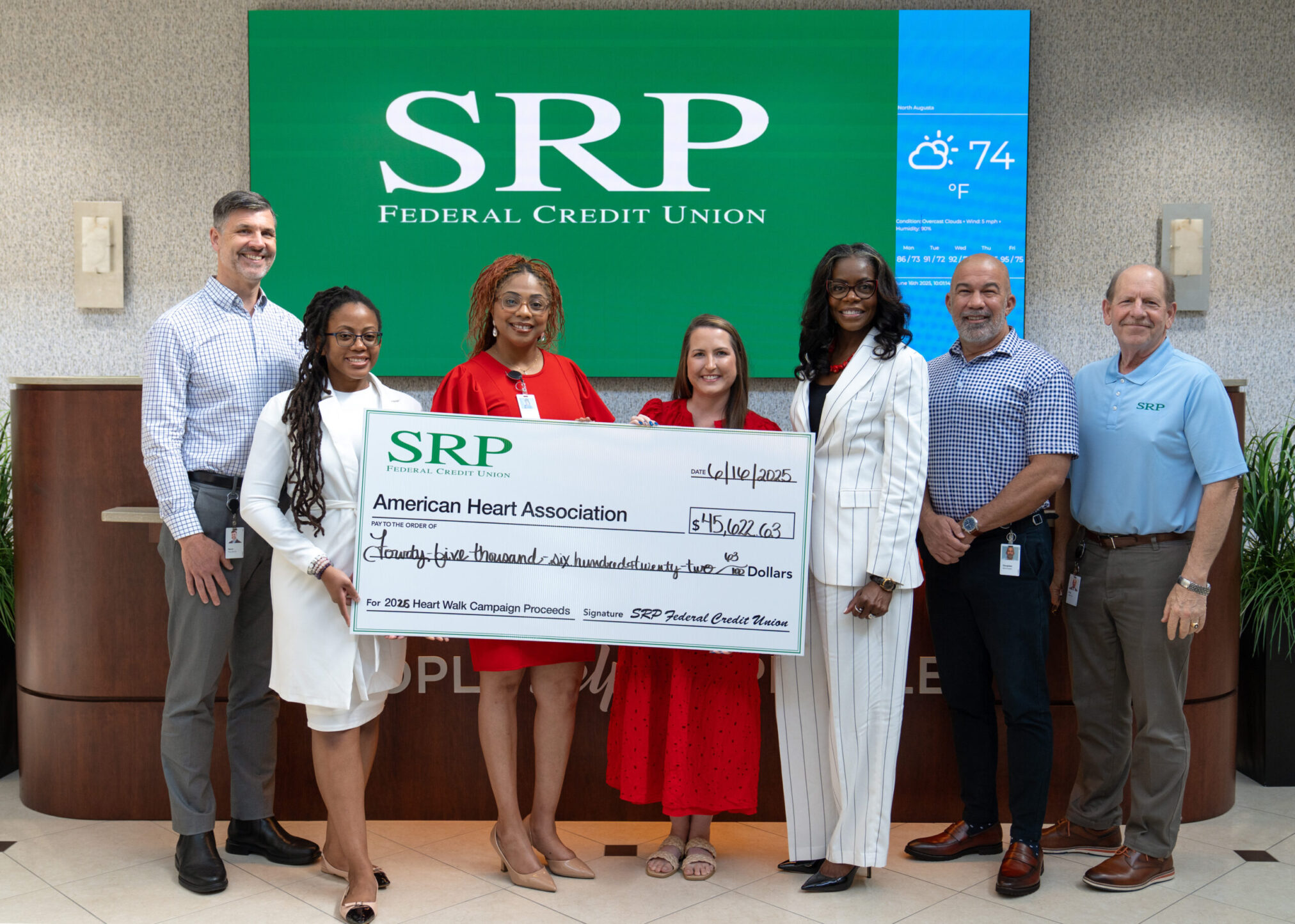 AHA Check Presentation 5.7 SRP representatives join Marah Curry, Augusta/Aiken Development Director for the American Heart Association, to present $45,622.63 to the nonprofit organization. From left to right: Kevin Toole, SRP Chief Lending Officer; Ieshia Bell, SRP Marketing Specialist; Charmaine Finch, SRP Community Engagement Specialist; Marah Curry, American Heart Association Augusta/Aiken Development Director; Liz Ponder, SRP CEO; Douglass Morris, SRP Chief Technology Officer; and Greg Gibson, SRP Chief Financial Officer.