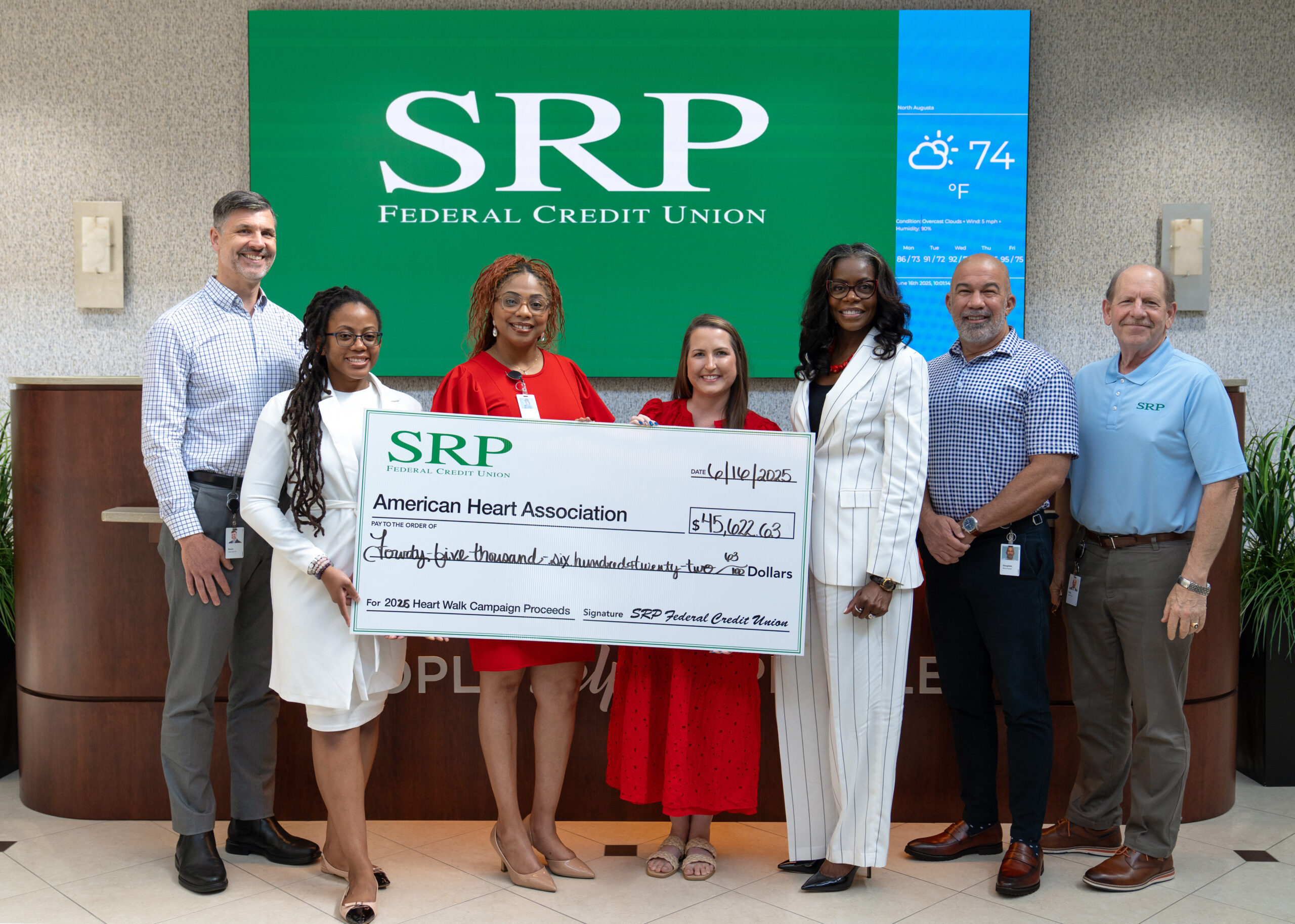 SRP representatives join Marah Curry, Augusta/Aiken Development Director for the American Heart Association, to present $45,622.63 to the nonprofit organization.

From left to right: Kevin Toole, SRP Chief Lending Officer; Ieshia Bell, SRP Marketing Specialist; Charmaine Finch, SRP Community Engagement Specialist; Marah Curry, American Heart Association Augusta/Aiken Development Director; Liz Ponder, SRP CEO; Douglass Morris, SRP Chief Technology Officer; and Greg Gibson, SRP Chief Financial Officer.