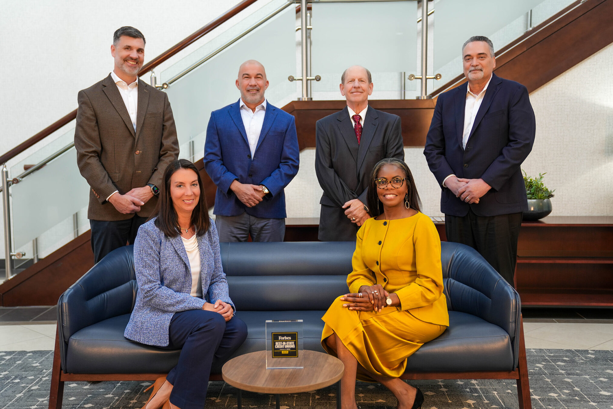 SRP executives with the physical Forbes Award for Georgia Best-in-State Credit Union