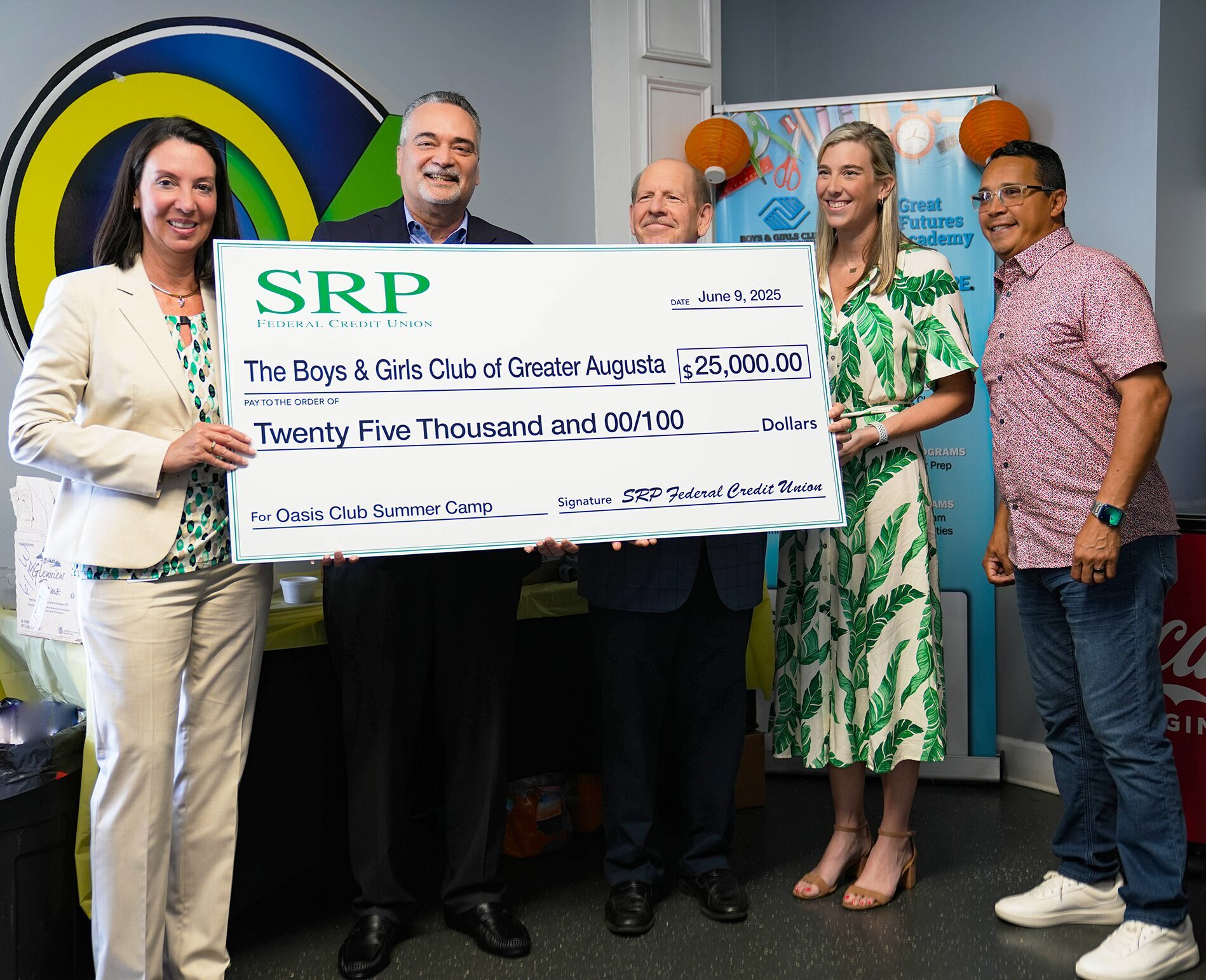 SRP representatives Shana Reid, Luis Alejandro, and Greg Gibson join Catherine Center, VP of Development for Boys & Girls Clubs of Greater Augusta, and Christian Center OasisVIP Multicultural Church Pastor Angel Maestre with a ceremonial check for $25,000 to help fund the Oasis Club Summer Camp.