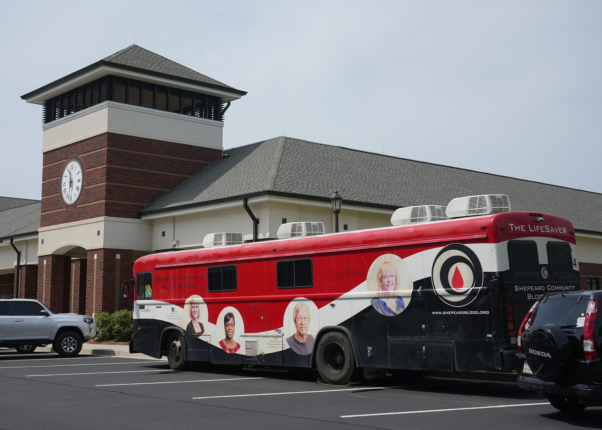 The Shepeard Community Blood Center's Bloodmobile is parked outside SRP Federal Credit Union's administrative building for a community blood drive on April 22, 2025.