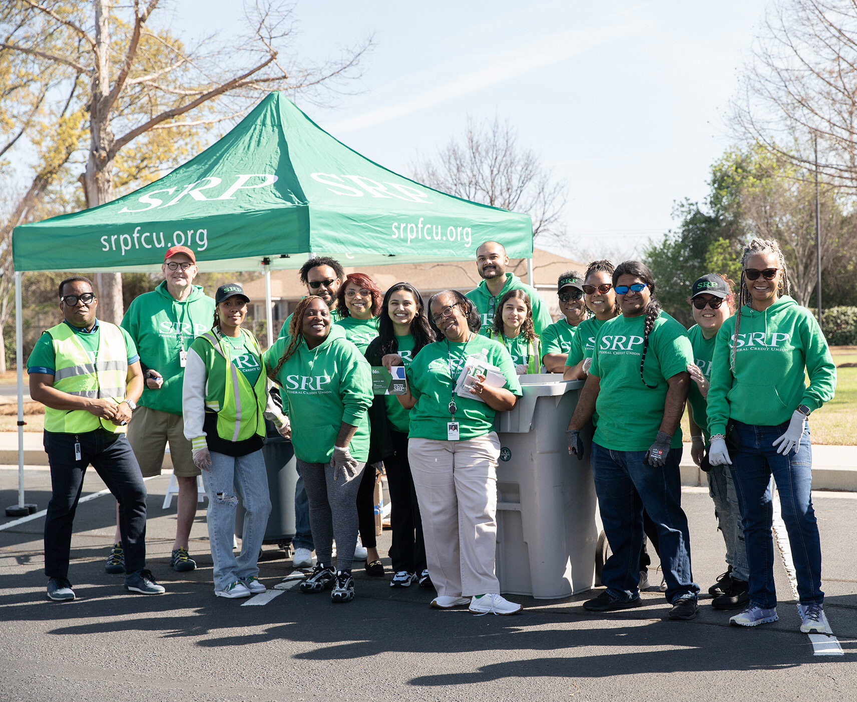 SRP Federal Credit Union employees, along with SRP Board of Directors Chairman Sandra DeVoe Bland, gather outside SRP's Administrative Campus for Shred Fest.