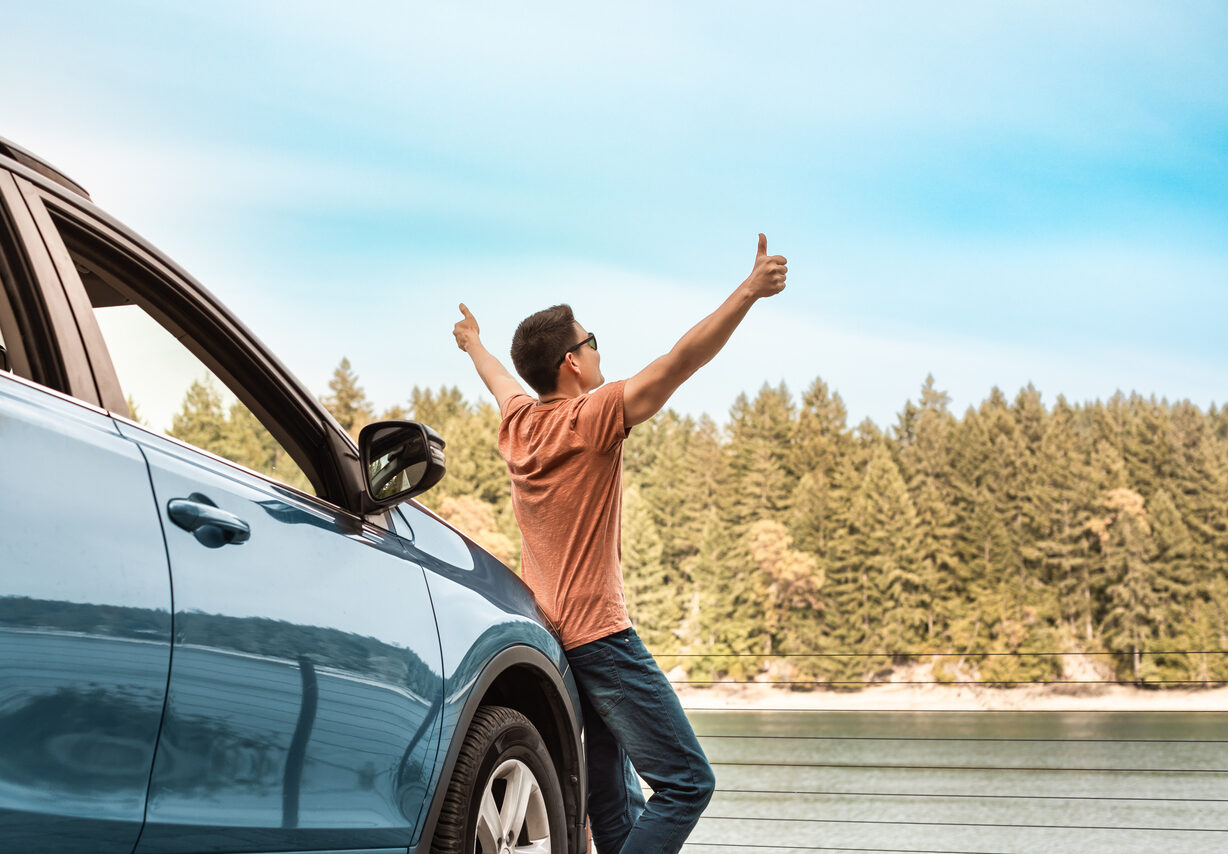 Man enjoying beautiful view at his road trip.