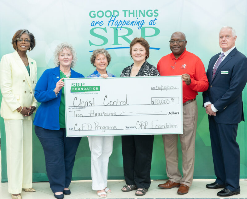 SRP Foundation - Christ Central Representatives of the SRP Foundation and Christ Central Aiken and Graniteville hold a ceremonial check for $10,000, representing a donation for Christ Central's GED programming.