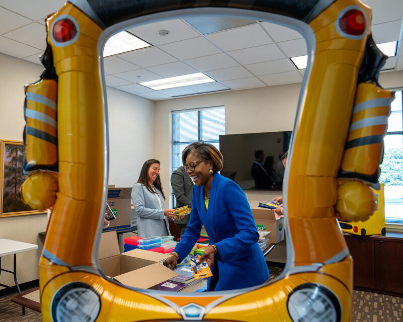 SRP CEO Liz Ponder sorts school supplies.