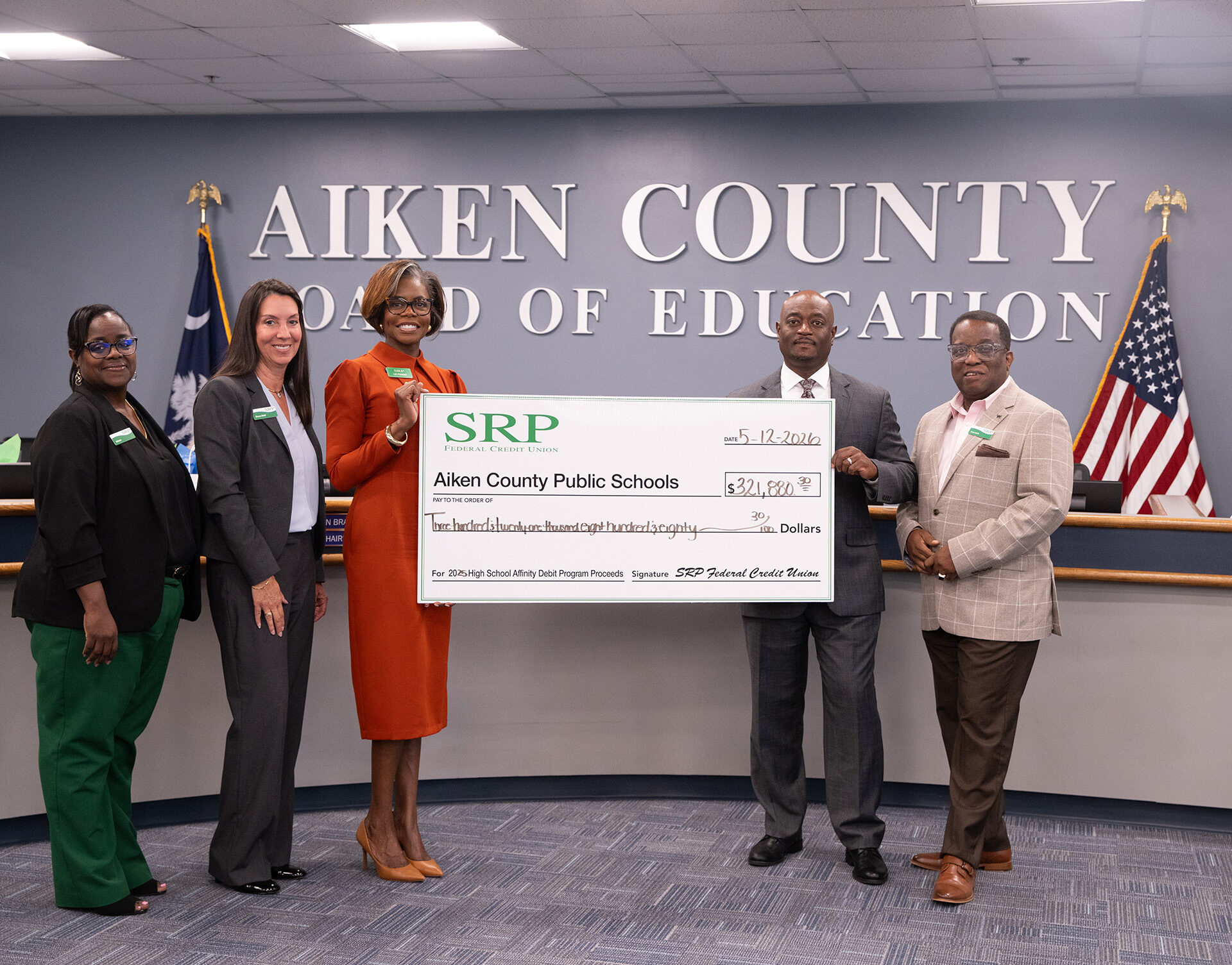 Aiken County Affinity Check Presentation SRP leaders join Aiken County Public Schools Superintendent Dr. Corey Murphy for an SRP Affinity check presentation at the Aiken County Board of Education.
