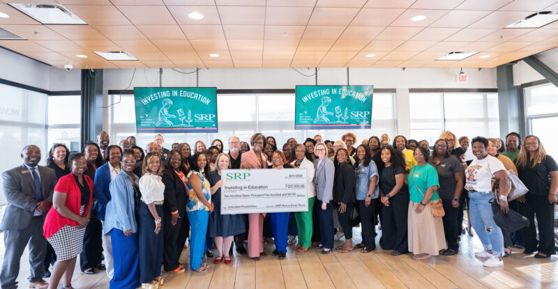 Representatives of schools and school districts across the CSRA join SRP Federal Credit Union leaders in a check presentation for local elementary schools.