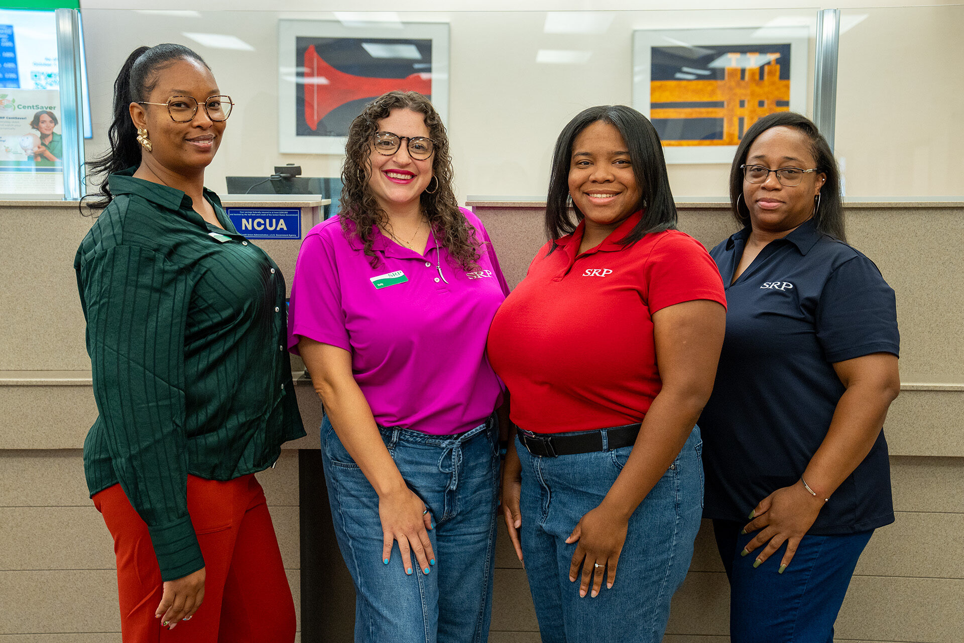 Burnettown Tellers Four tellers stand in front of the teller line at the SRP Burnettown Branch.