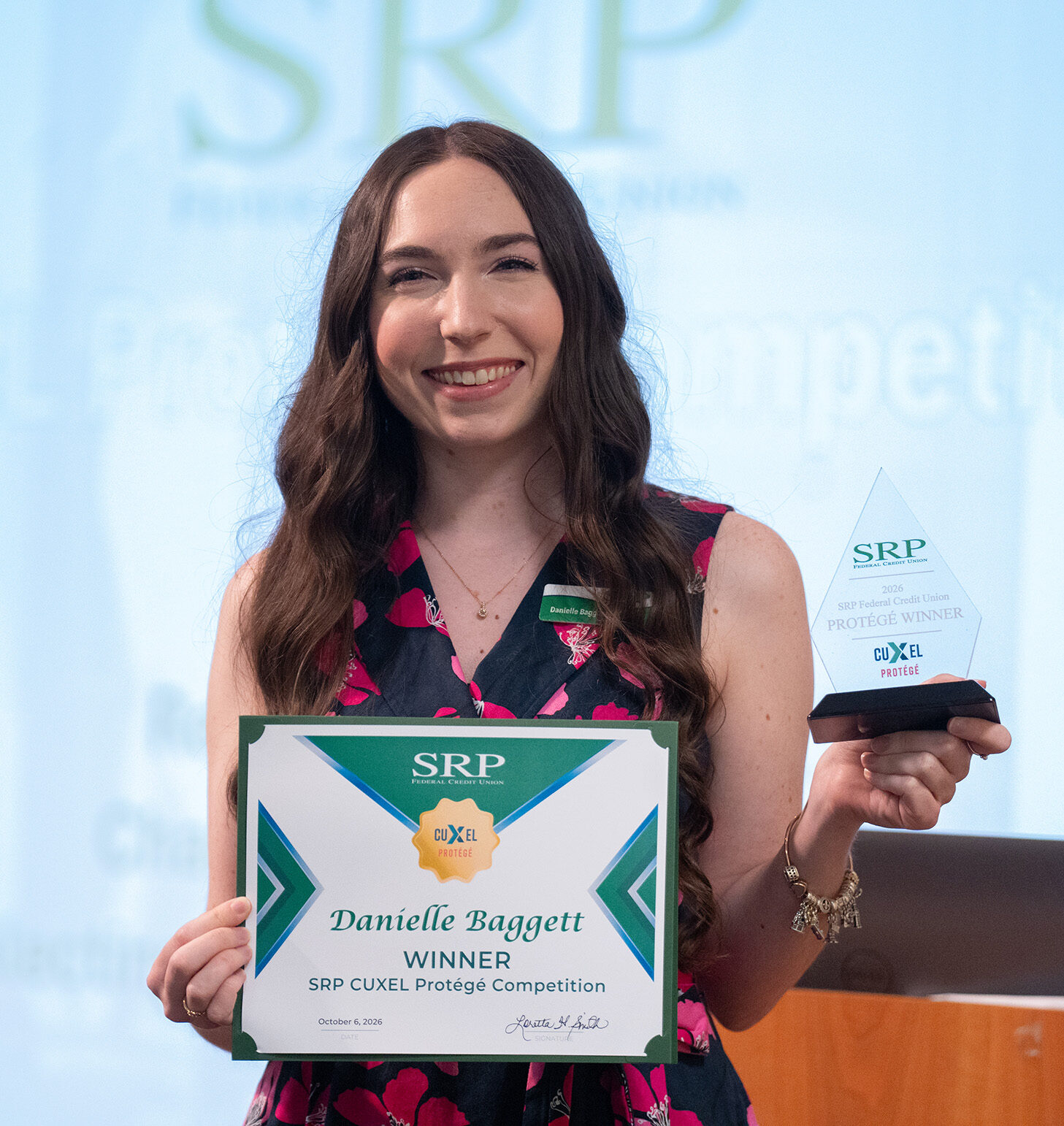 SRP-Protege-Danielle-Baggett SRP Data Analyst Danielle Baggett wins the company-level CUxEL Protégé Speech Competition.